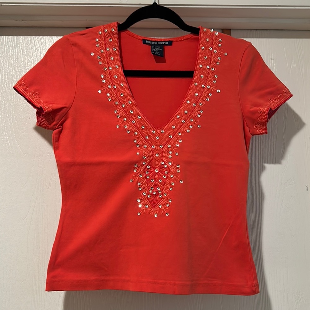 Ladies orange crop top with embellished front